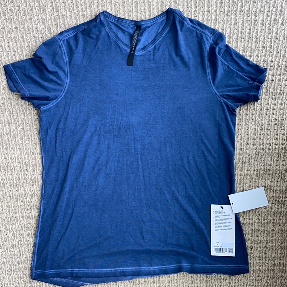 Lululemon 5 year basic with tags. Never worn.